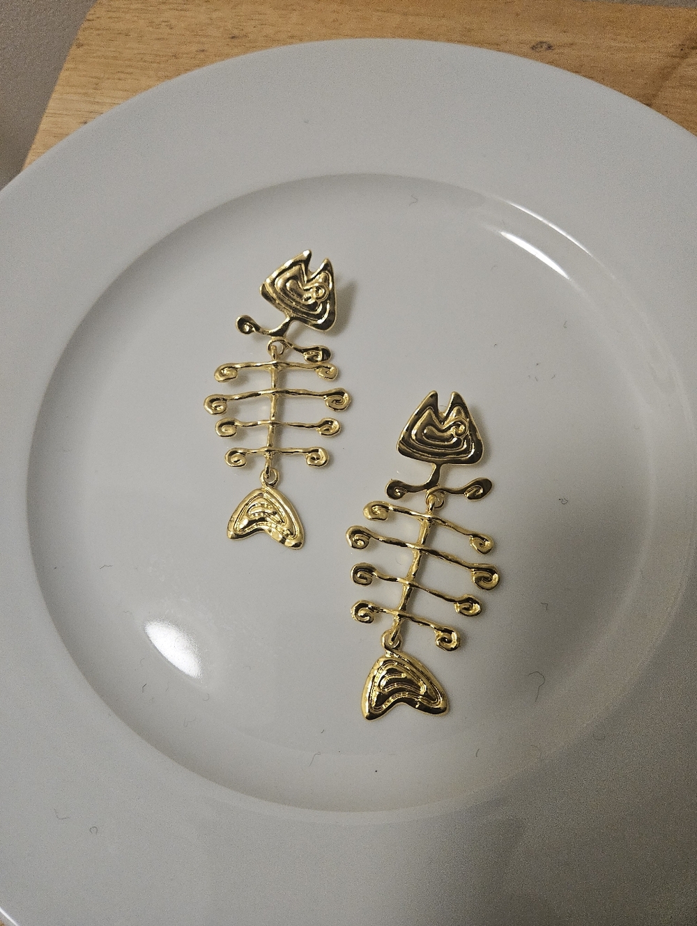 Gold Fishbone Earrings.